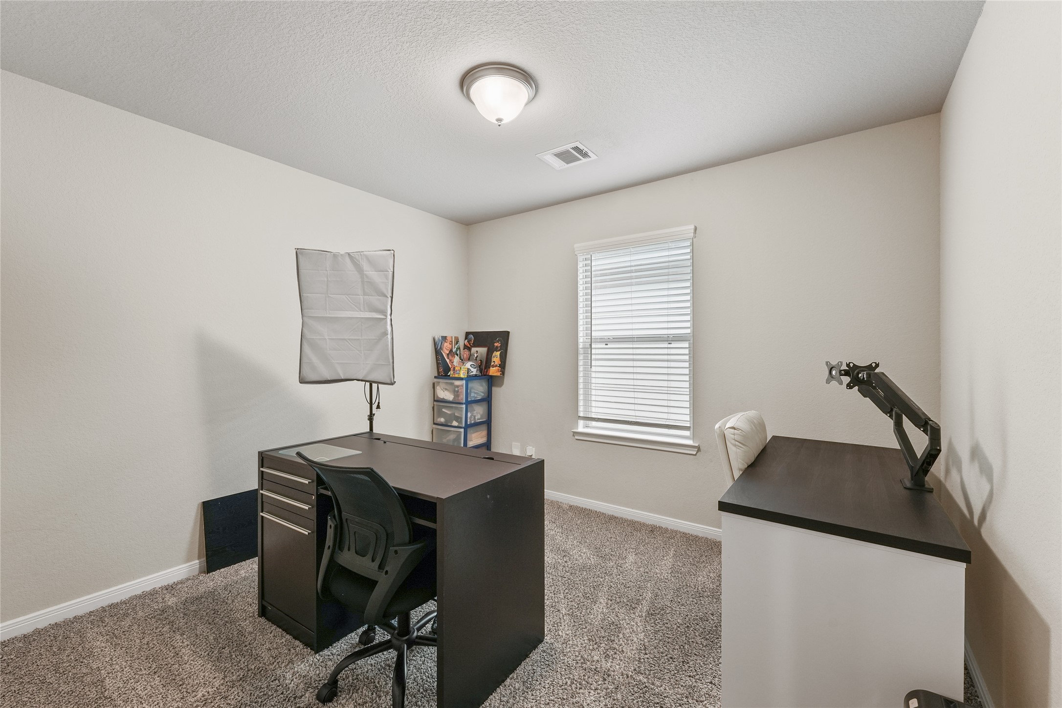 7911 Tuscan Cypress Drive Cypress, TX 77433 - Photo 18 of 27 a room with furniture and a window