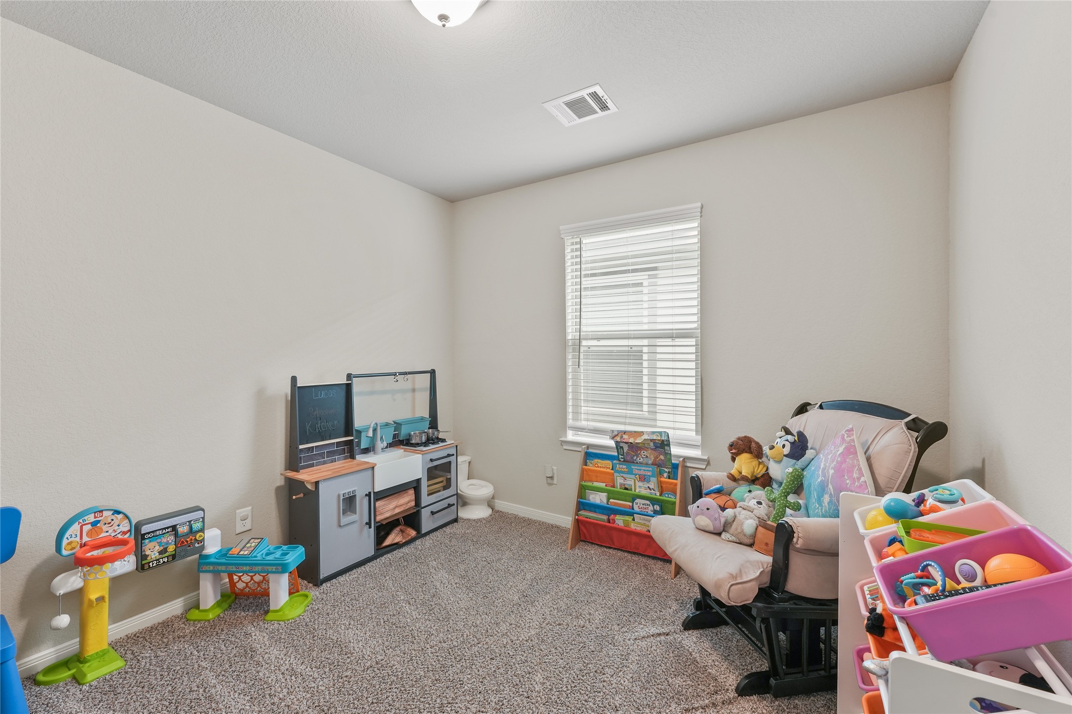 7911 Tuscan Cypress Drive Cypress, TX 77433 - Photo 20 of 27 a room with toys and a couch