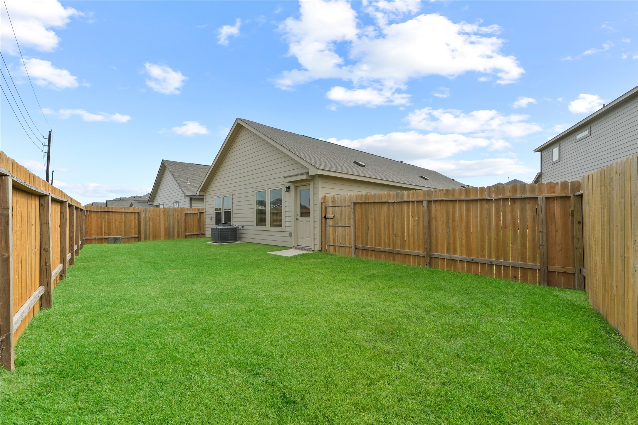 7911 Tuscan Cypress Drive Cypress, TX 77433 - Photo 22 of 27 a view of a backyard with plants and a garden