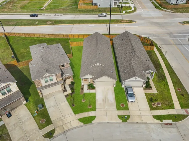swimming pool view with a garden