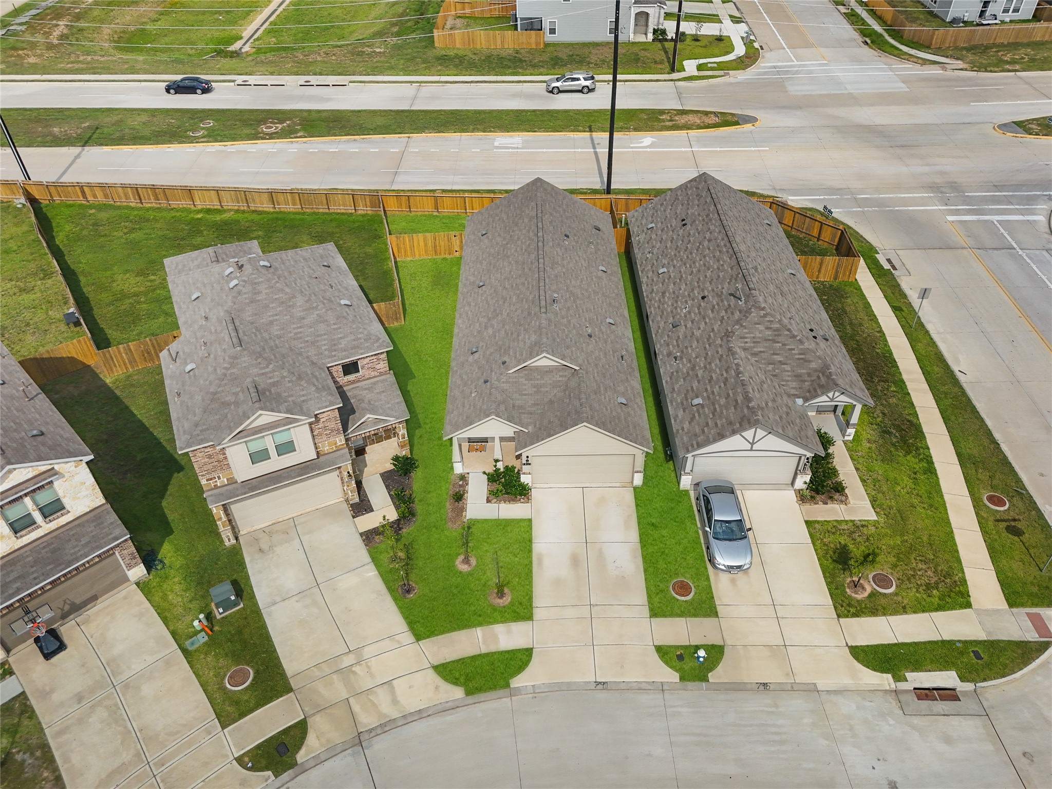 7911 Tuscan Cypress Drive Cypress, TX 77433 - Photo 23 of 27 swimming pool view with a garden