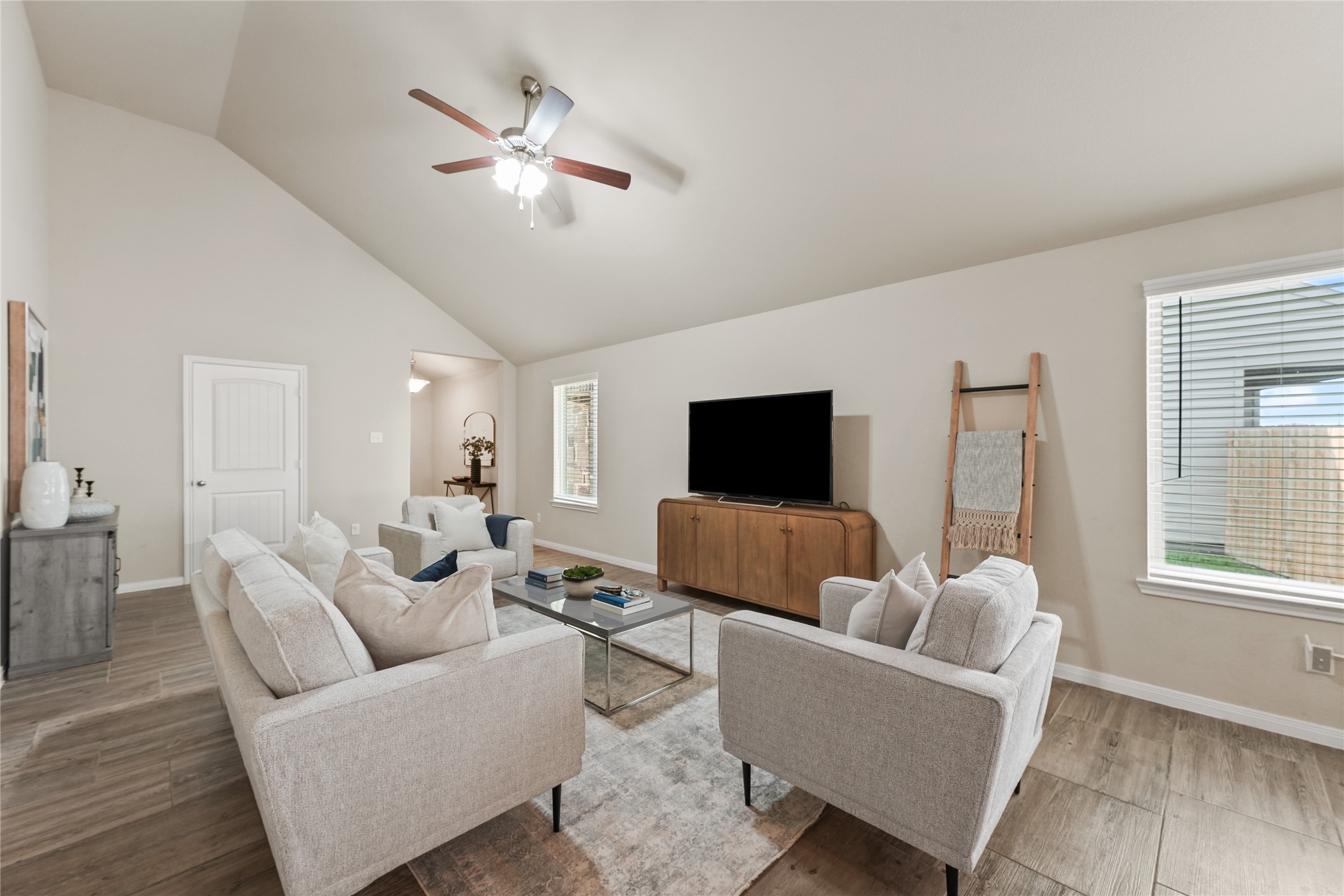 7911 Tuscan Cypress Drive Cypress, TX 77433 - Photo 5 of 27 a living room with furniture and a flat screen tv