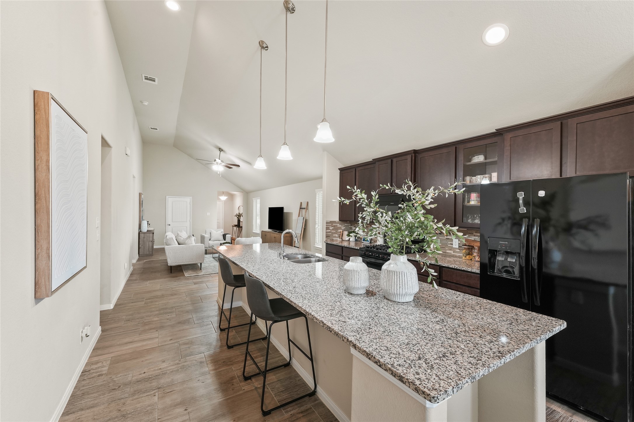 7911 Tuscan Cypress Drive Cypress, TX 77433 - Photo 6 of 27 a kitchen with a table and chairs