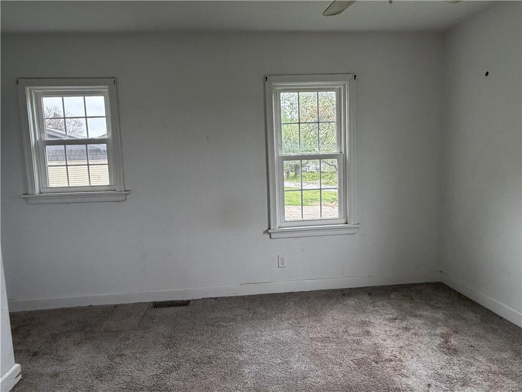 1146 Franklin Road Jackson Center, PA 16133 - Photo 13 of 19 an empty room with a window