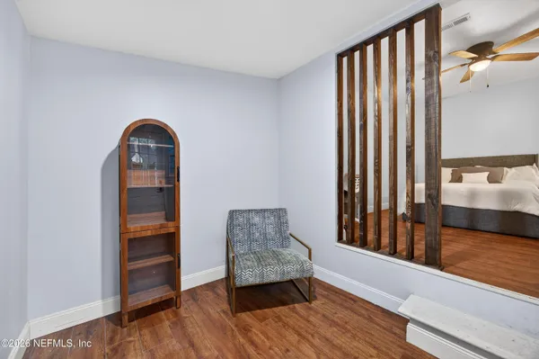 a view of livingroom with furniture and window