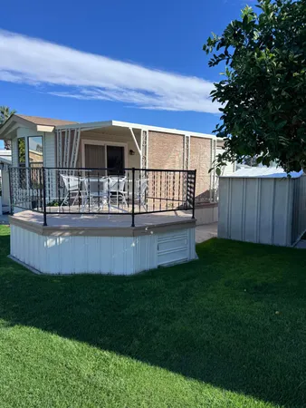 a view of backyard with green space