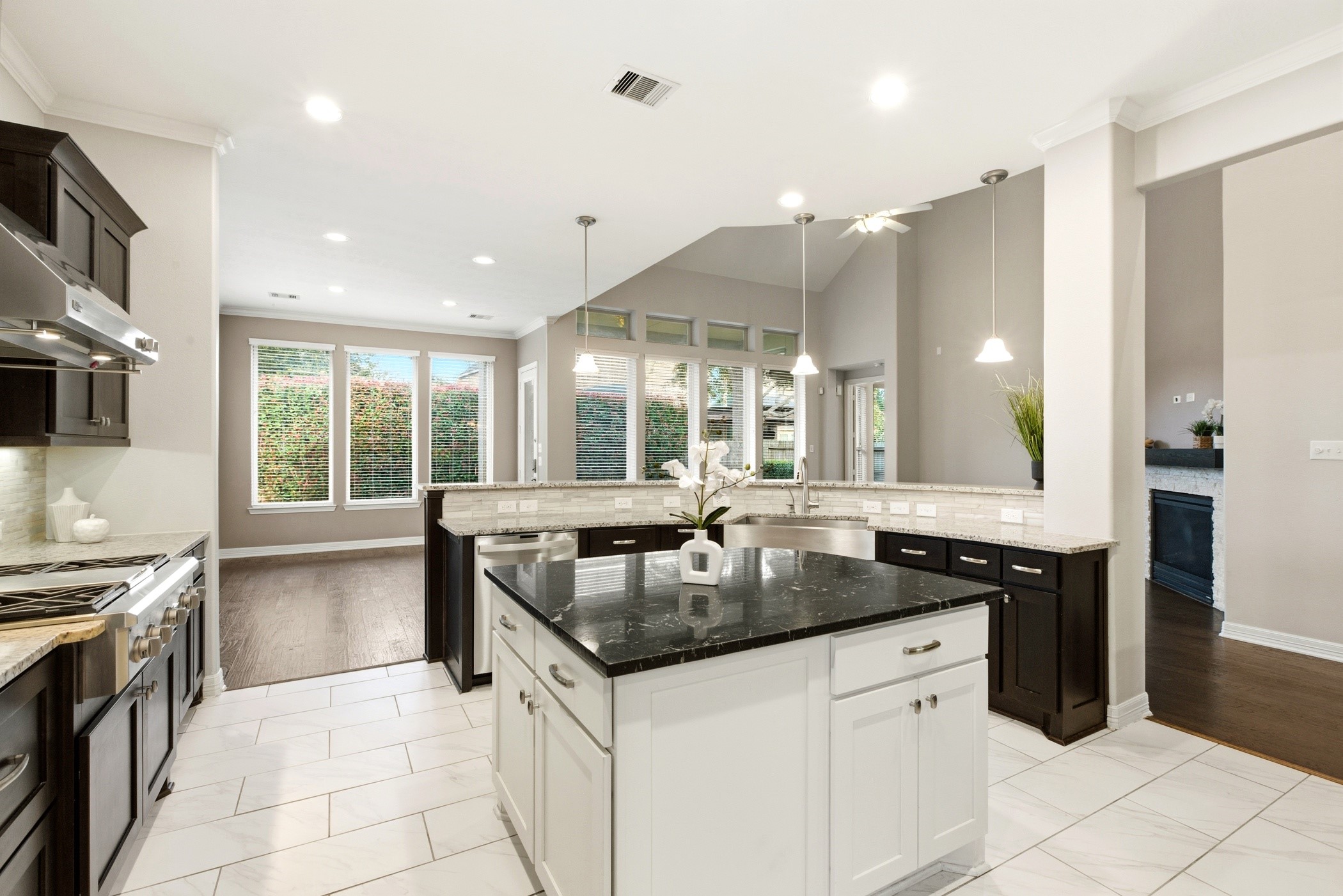 27834 Hunters Rock Lane Katy, TX 77494 - Photo 23 of 46 a kitchen with granite countertop a sink and stove
