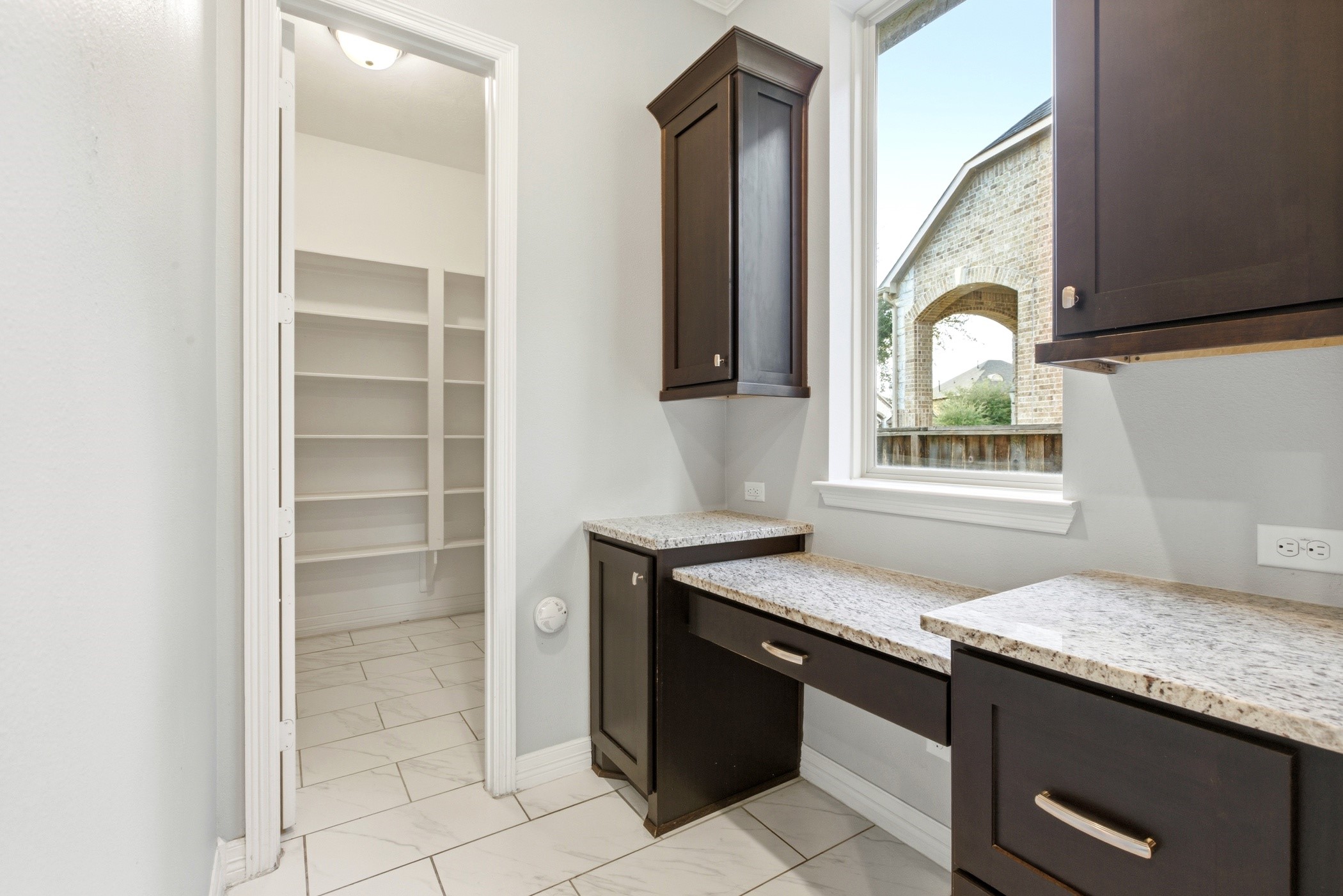 27834 Hunters Rock Lane Katy, TX 77494 - Photo 25 of 46 View of large pantry and work area from the kitchen.