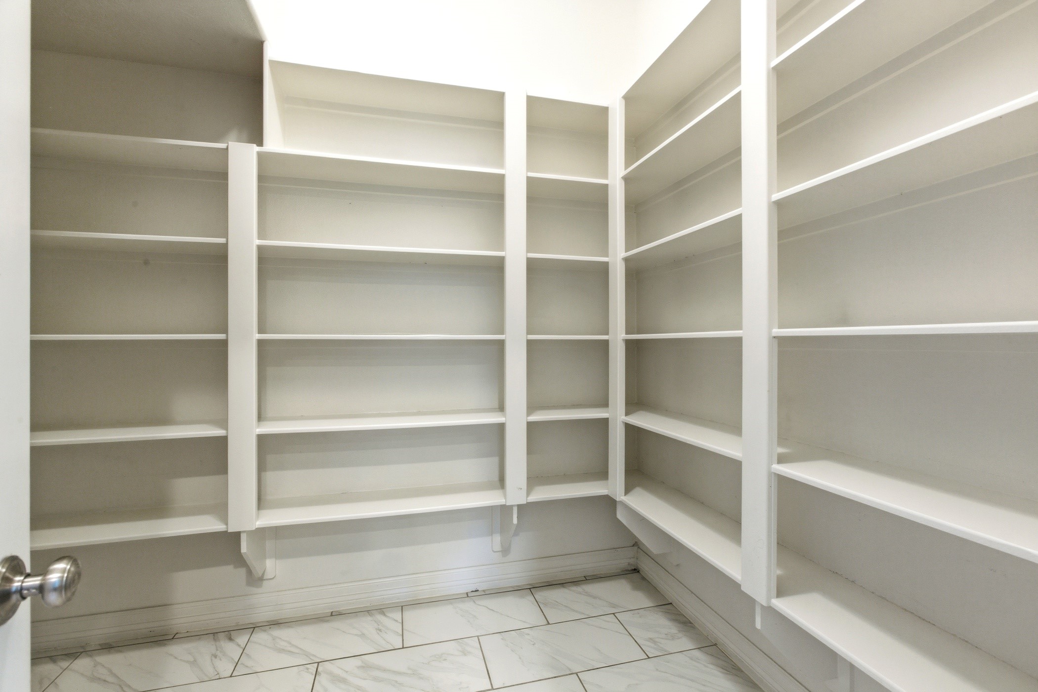 27834 Hunters Rock Lane Katy, TX 77494 - Photo 27 of 46 a view of walk in closet with empty racks