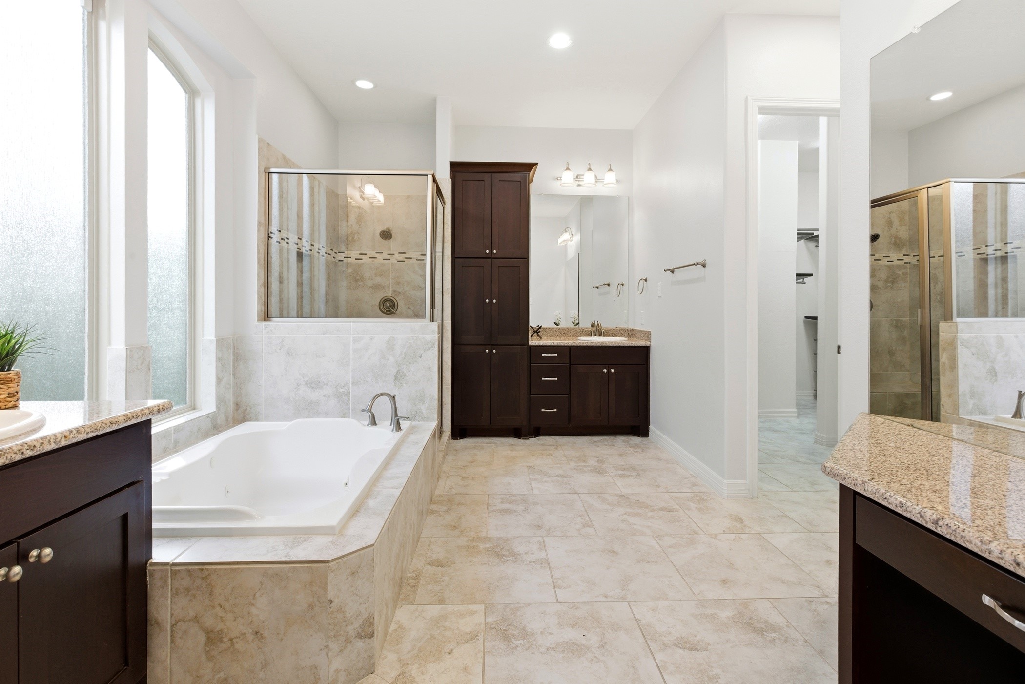 27834 Hunters Rock Lane Katy, TX 77494 - Photo 31 of 46 Primary bathroom with 2 sinks and separate vanity area.