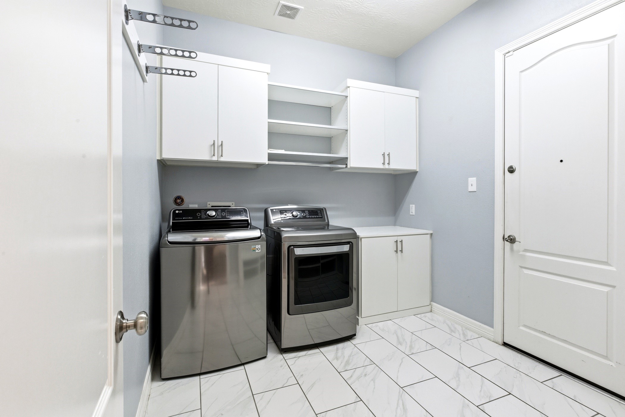 27834 Hunters Rock Lane Katy, TX 77494 - Photo 44 of 46 Laundry room downstairs. Washer and dryer included.
