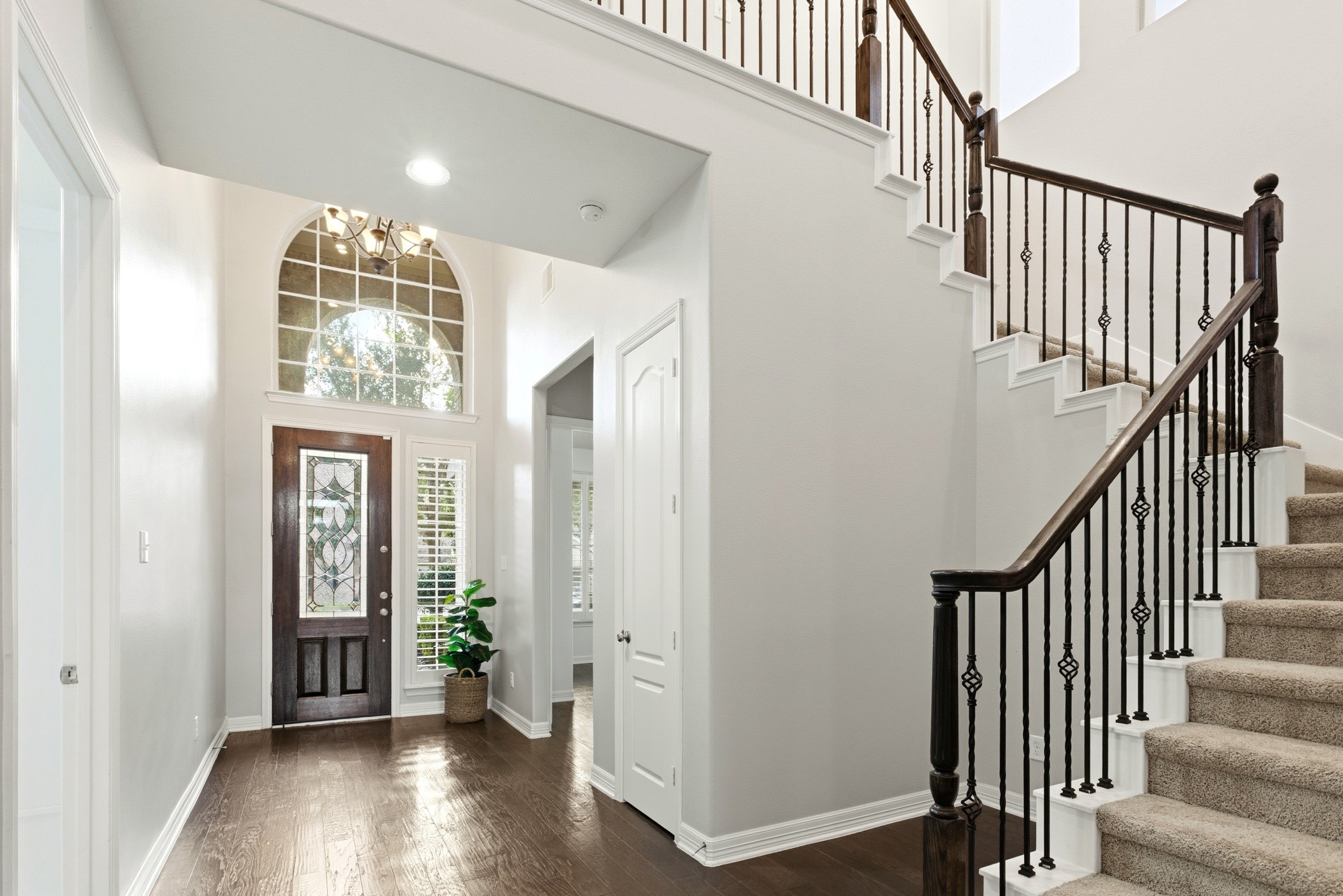 27834 Hunters Rock Lane Katy, TX 77494 - Photo 8 of 46 a view of entryway with wooden floor and stairs