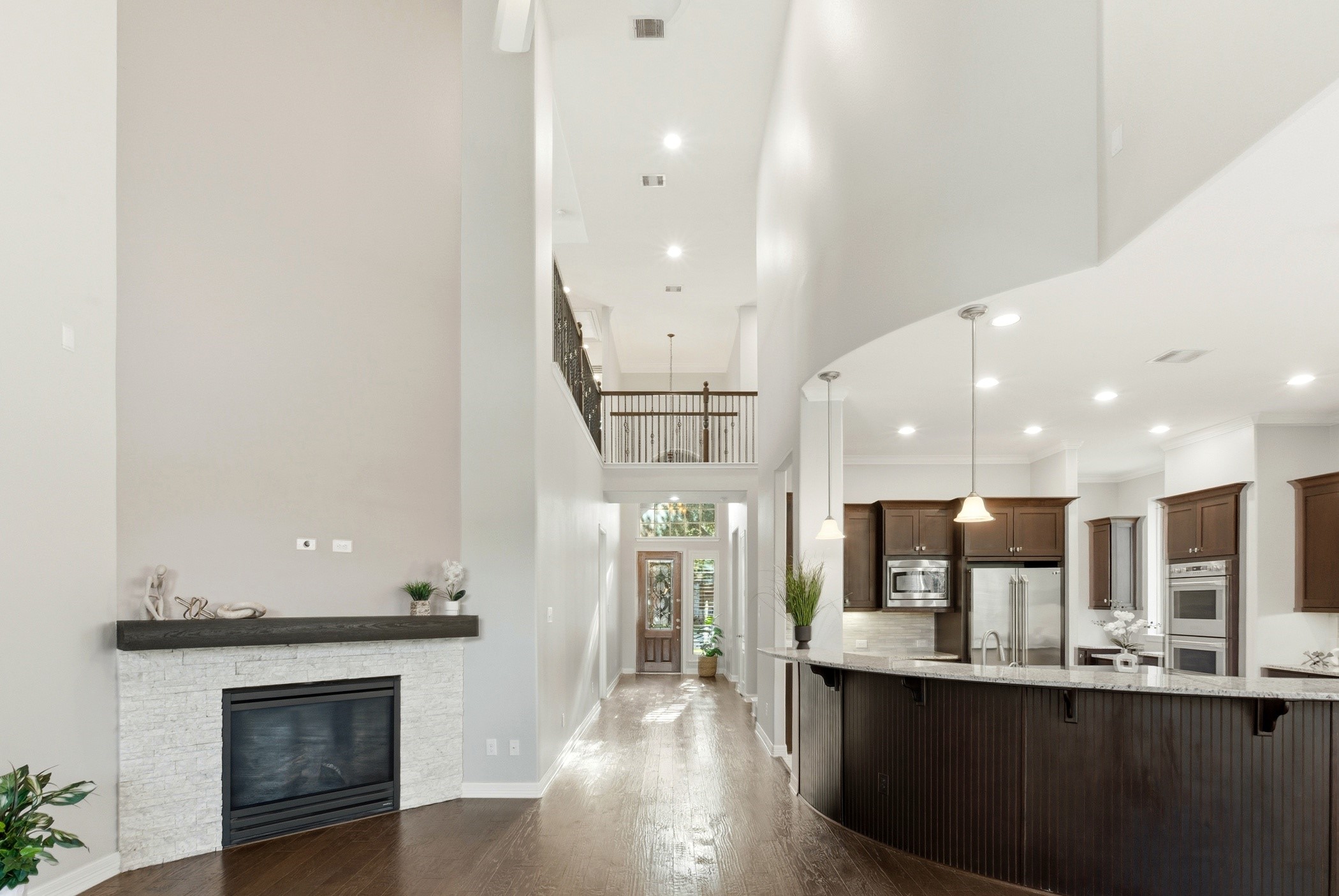 27834 Hunters Rock Lane Katy, TX 77494 - Photo 9 of 46 View of entry and soaring ceilings from the family room.