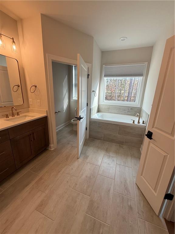 419 Duncan Dene Drive, Unit 140 Alpharetta, GA 30022 - Photo 17 of 22 a view of an empty room with a fireplace