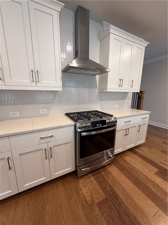 419 Duncan Dene Drive, Unit 140 Alpharetta, GA 30022 - Photo 6 of 22 a kitchen with stainless steel appliances granite countertop a stove a sink and white cabinets
