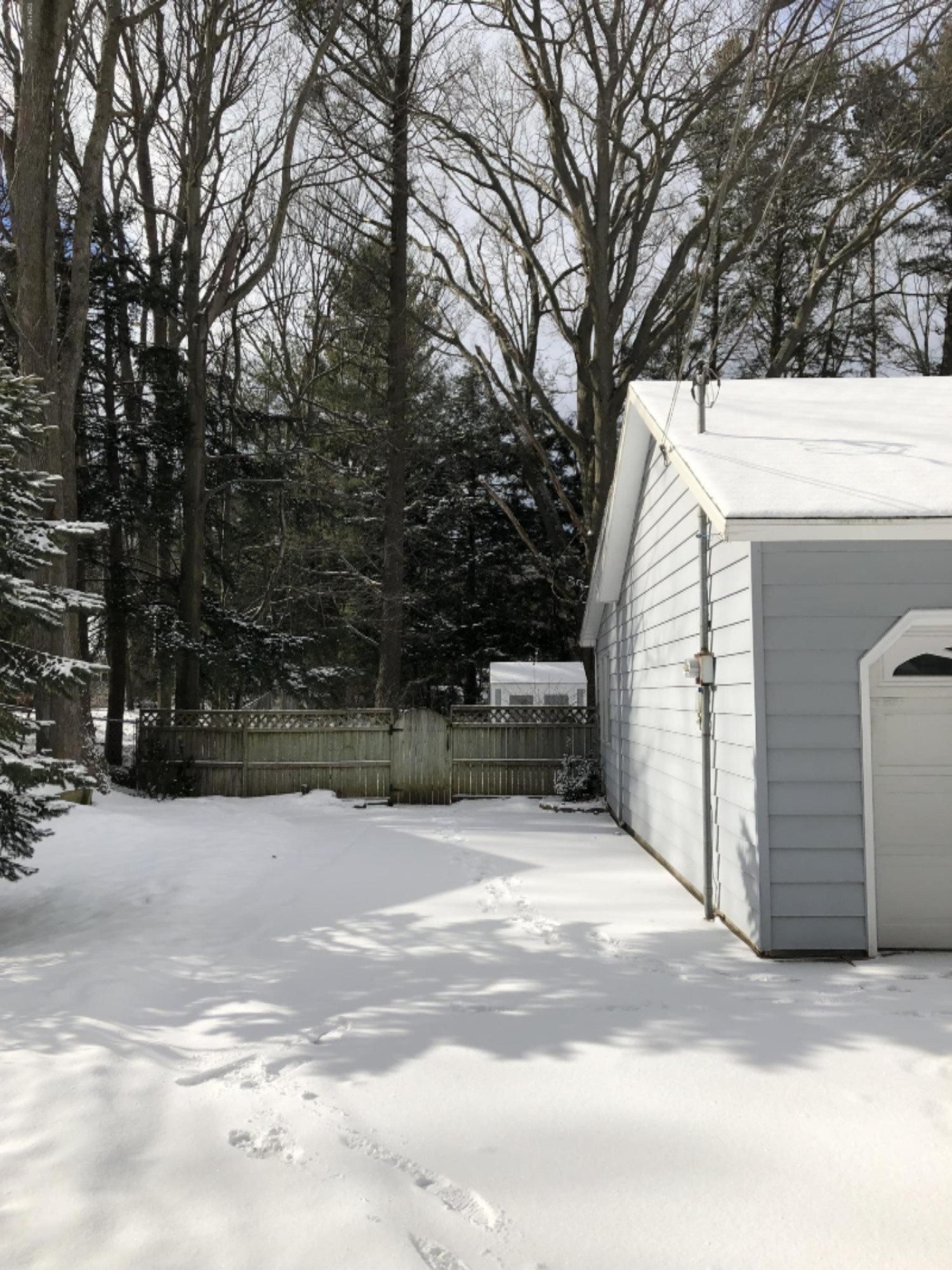 1349 Ivanhoe Road Ludington, MI 49431 - Photo 2 of 57 Garage Side of House