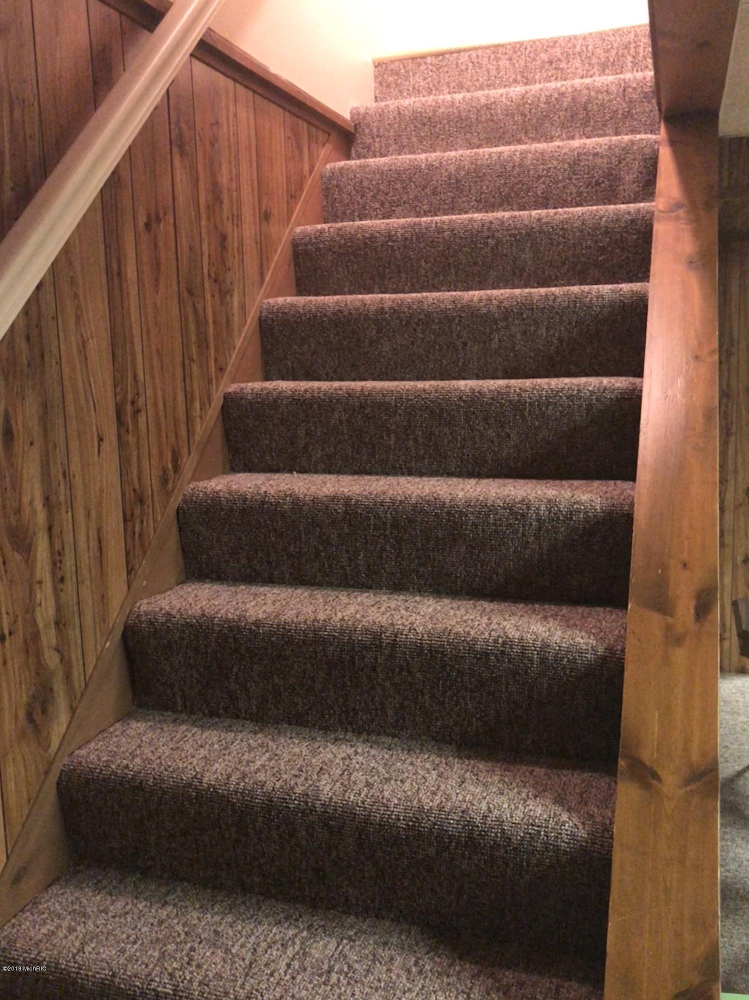 1349 Ivanhoe Road Ludington, MI 49431 - Photo 40 of 57 Basement Stair