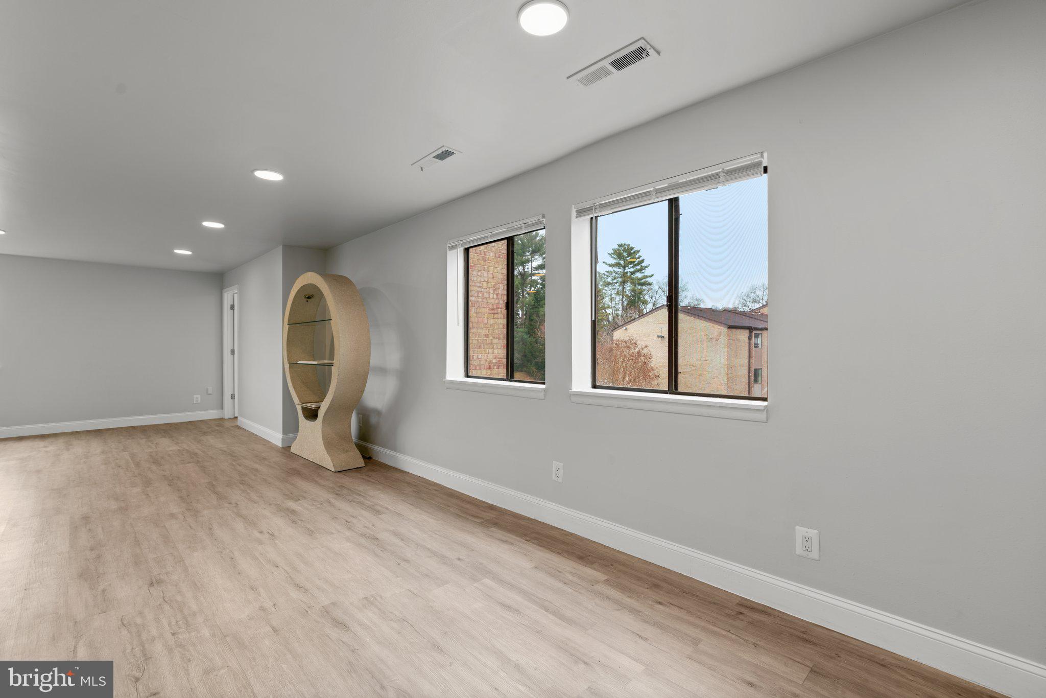 19048 Mills Choice Road, Unit 19048 Gaithersburg, MD 20886 - Photo 14 of 40 a view of an empty room with a window