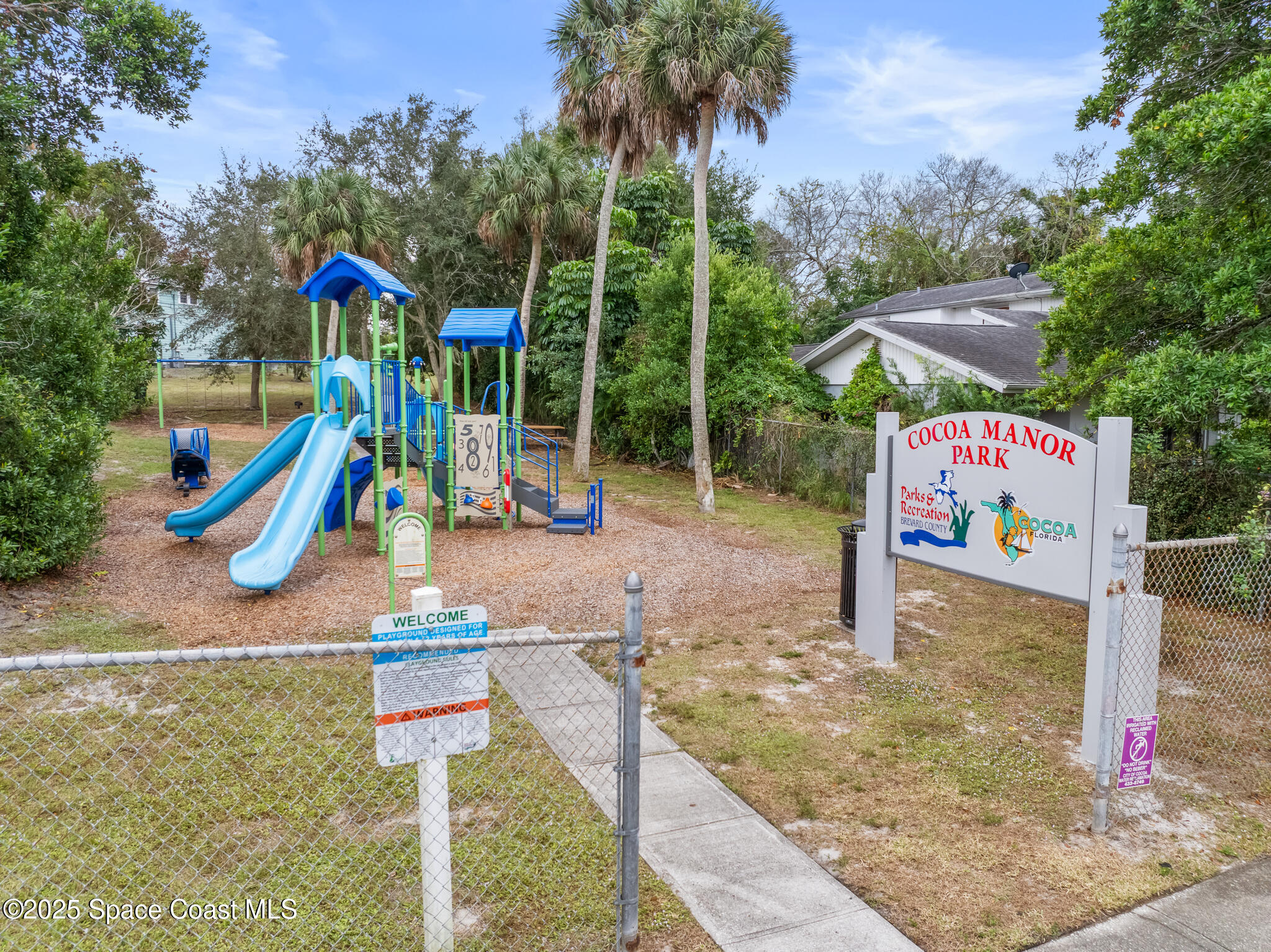 233 Broadview Drive Cocoa, FL 32922 - Photo 13 of 16 a park view with a entertaining space
