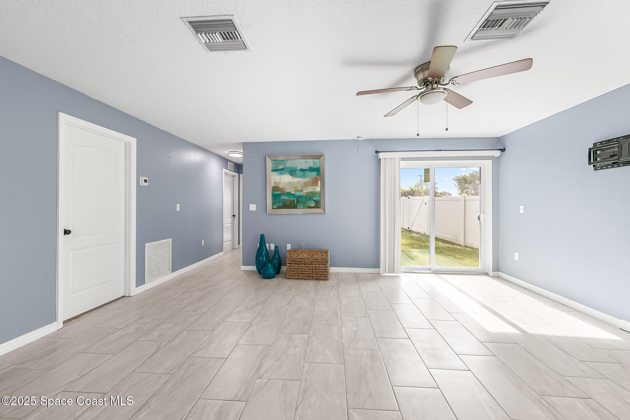 233 Broadview Drive Cocoa, FL 32922 - Photo 16 of 44 a view of an empty room with a window