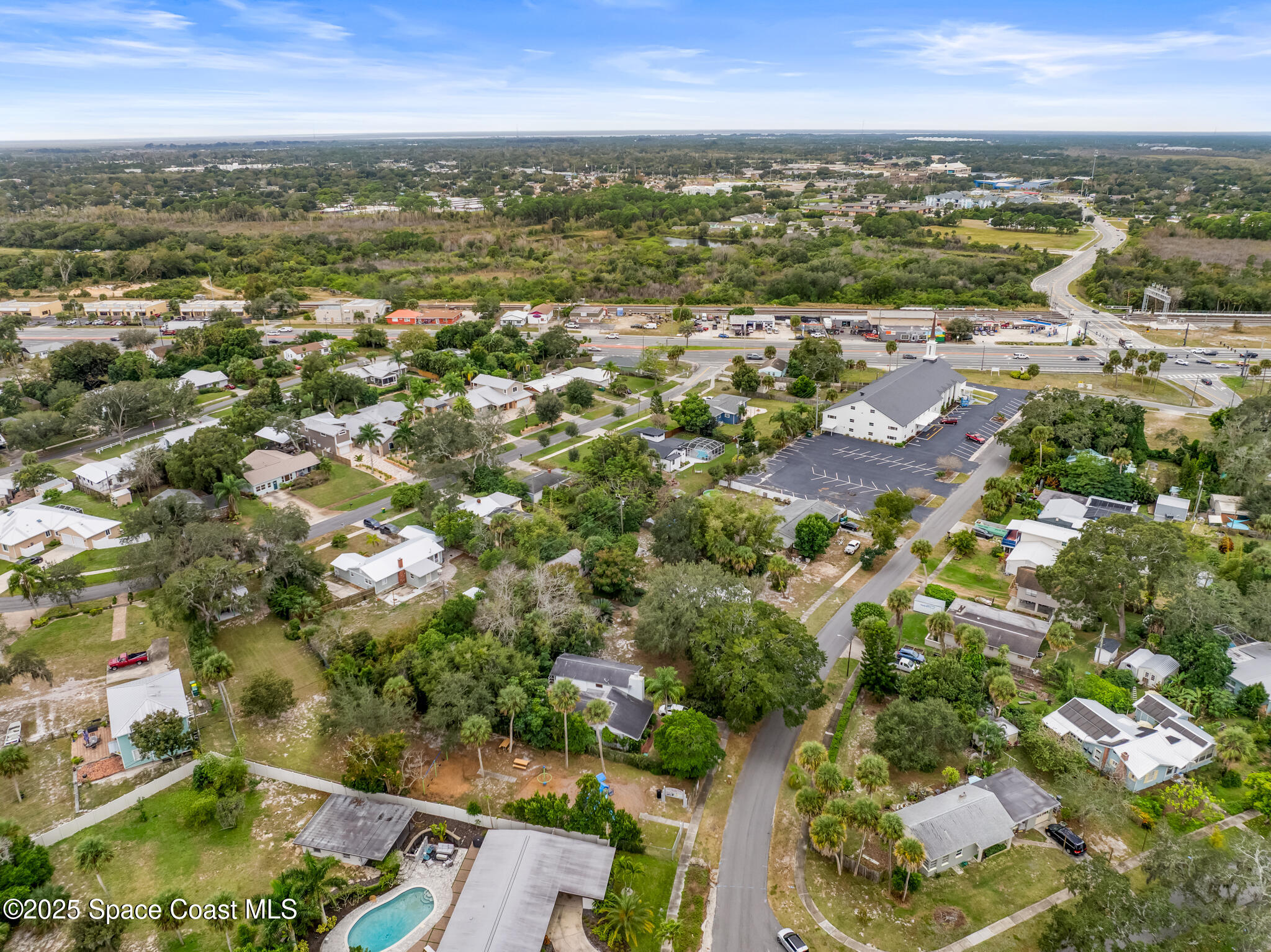 233 Broadview Drive Cocoa, FL 32922 - Photo 34 of 44 an aerial view of residential houses with outdoor space