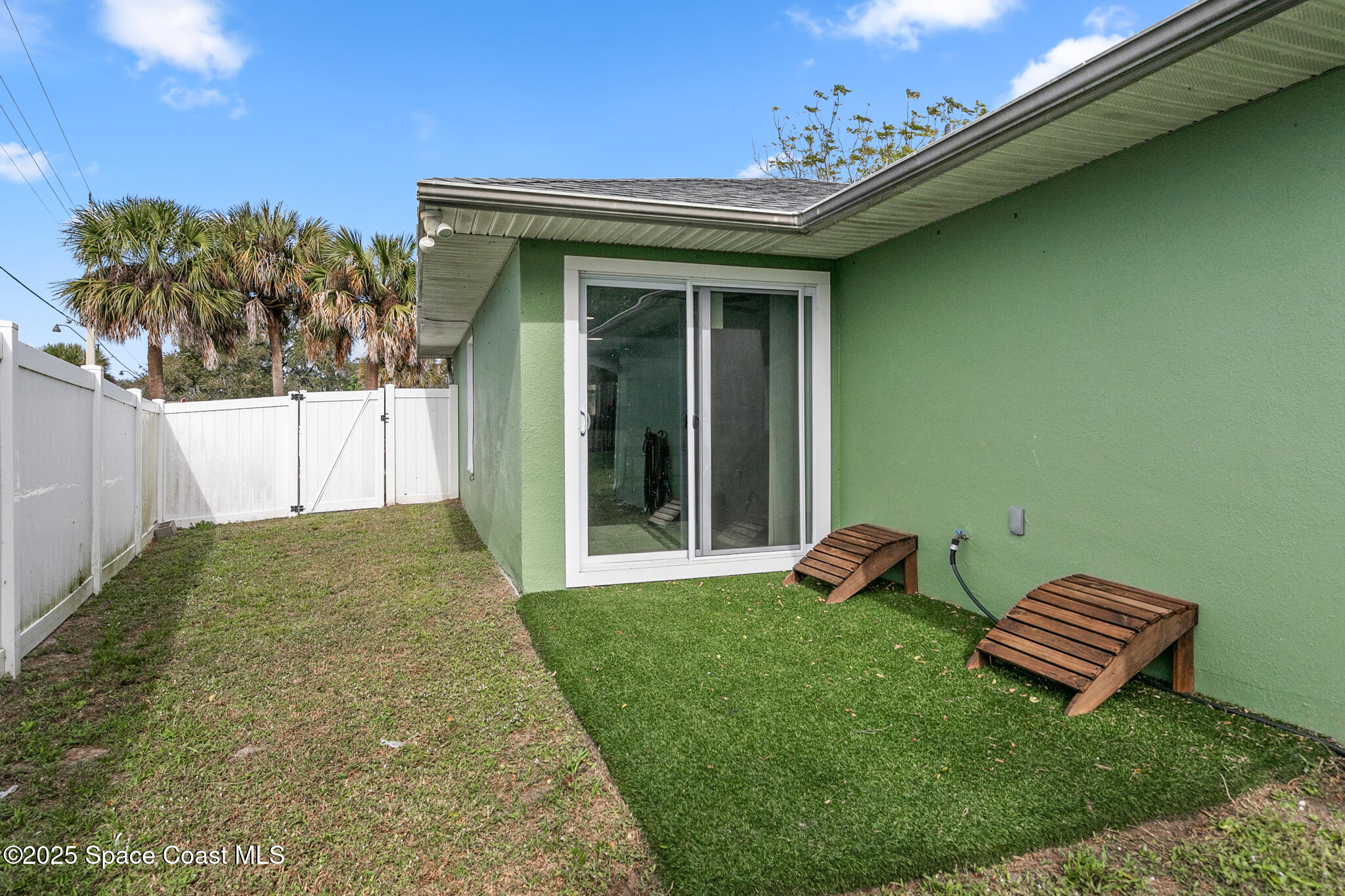 233 Broadview Drive Cocoa, FL 32922 - Photo 39 of 44 a view of a backyard with a sitting area