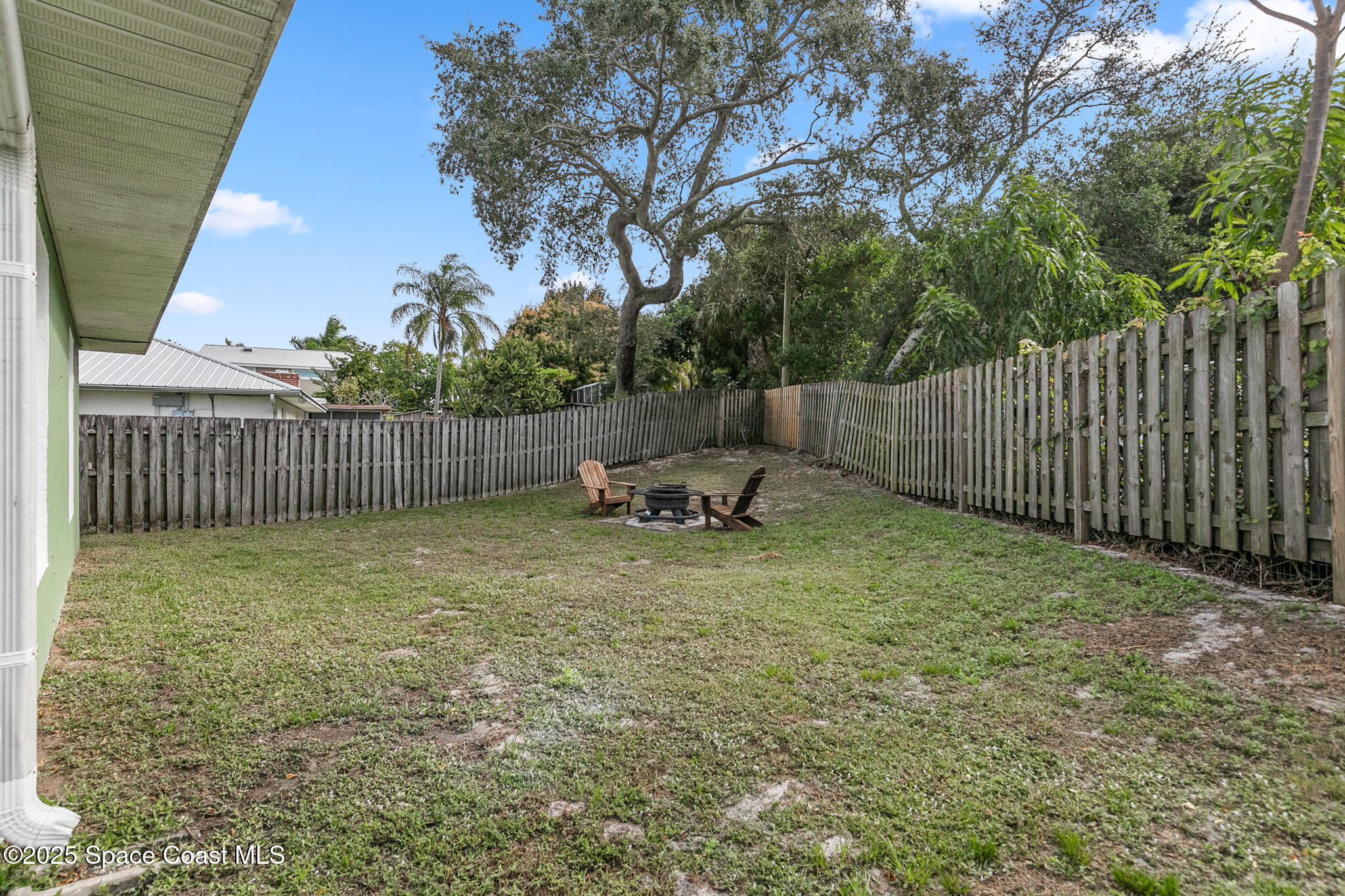 233 Broadview Drive Cocoa, FL 32922 - Photo 41 of 44 a garden with wooden fence