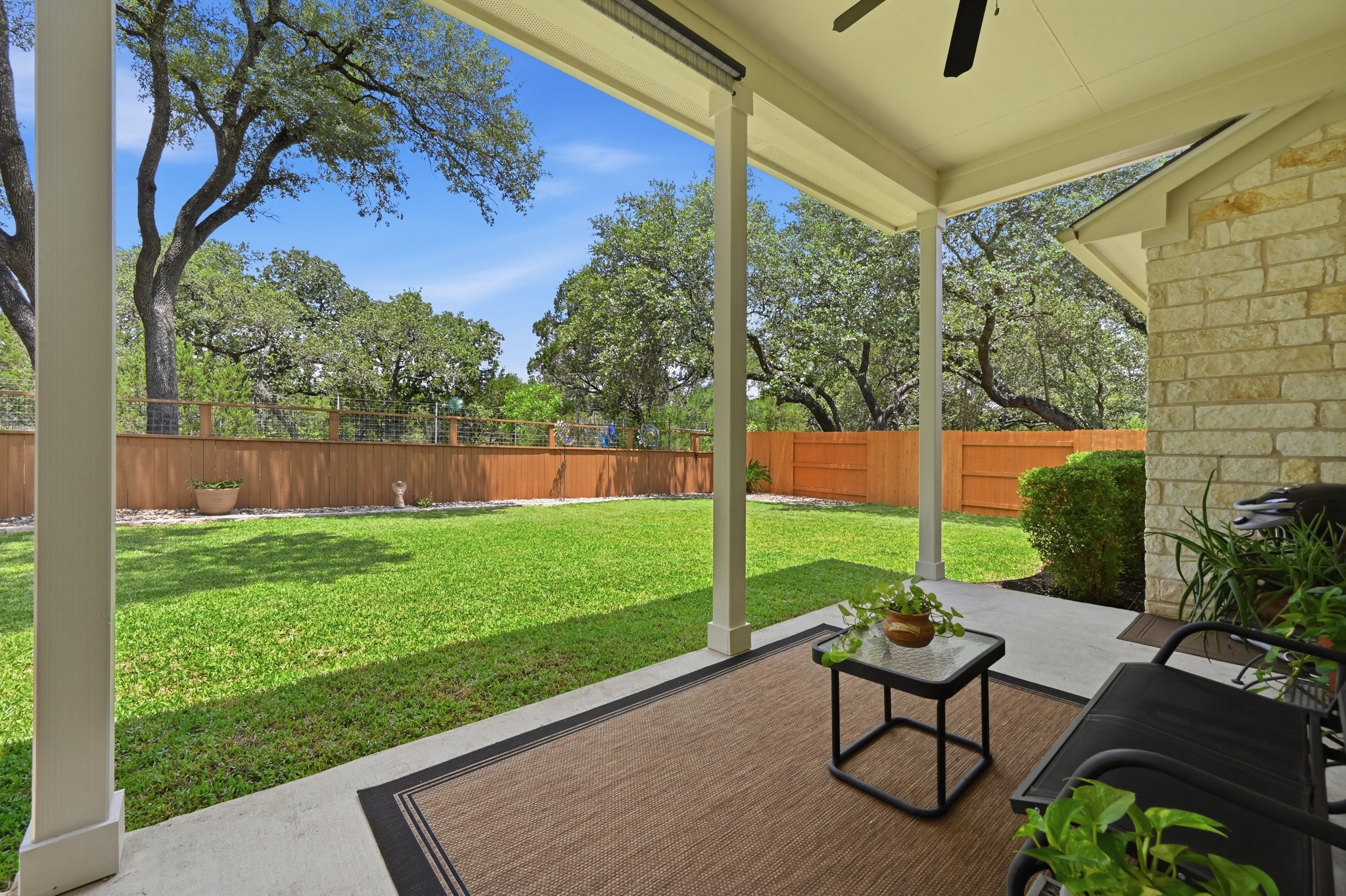 7301 Seneca Falls Loop Austin, TX 78739 - Photo 33 of 36 The covered patio give you the shade you need to enjoy the private view of the greenbelt.