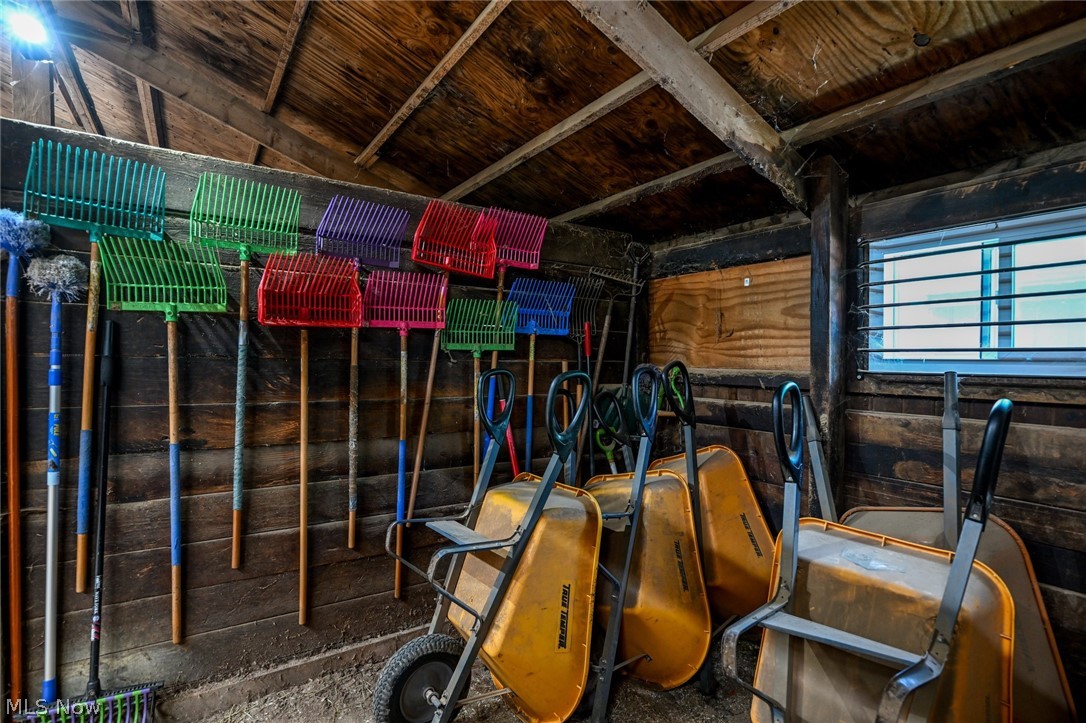 24481 Barrett Road Olmsted Falls, OH 44138 - Photo 45 of 49 storage room with picks, wheelbarrows