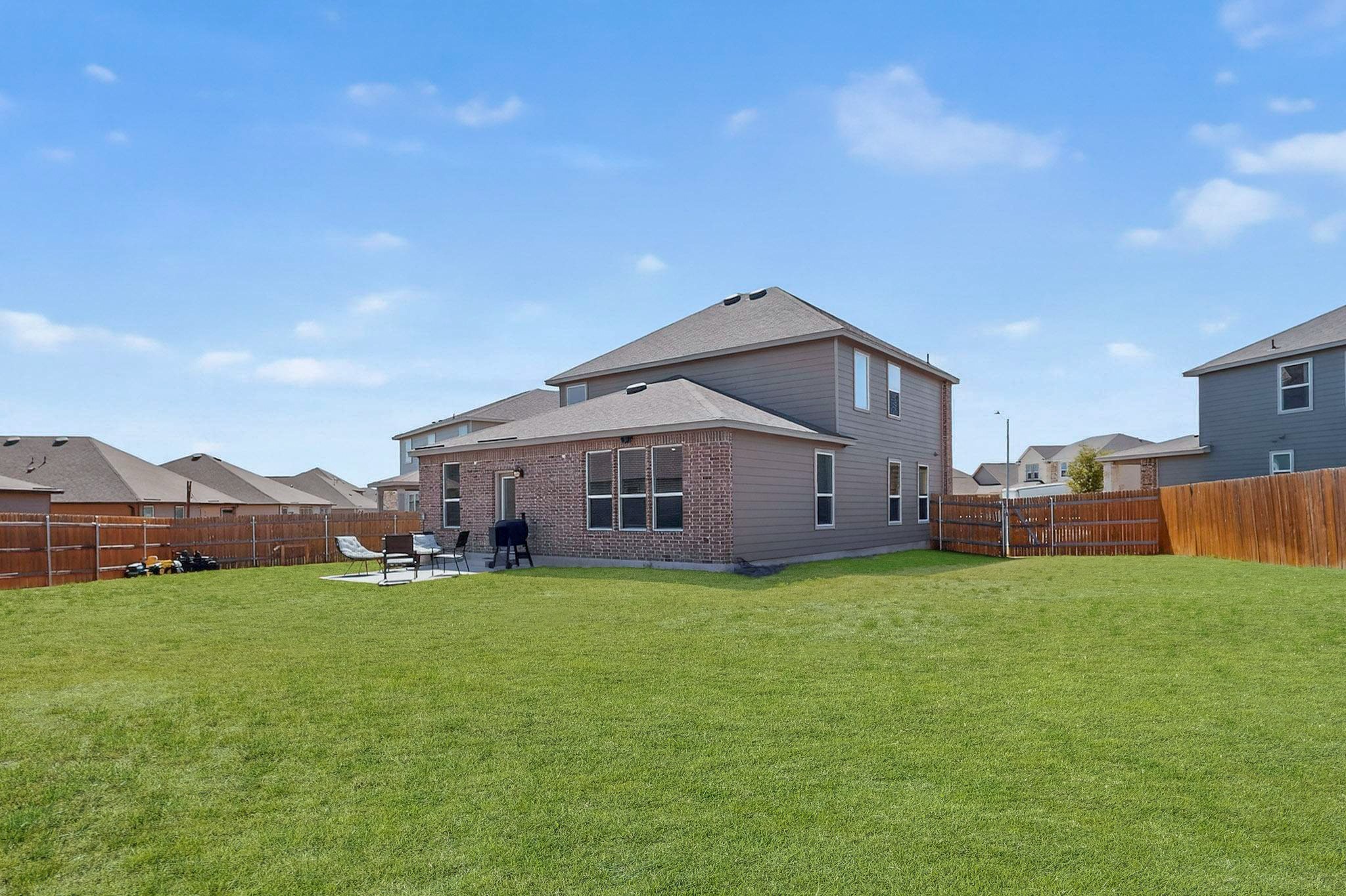 14513 Booted Eagle Pass Elgin, TX 78621 - Photo 31 of 33 Lots of room on each side of the home. Endless possibilities.