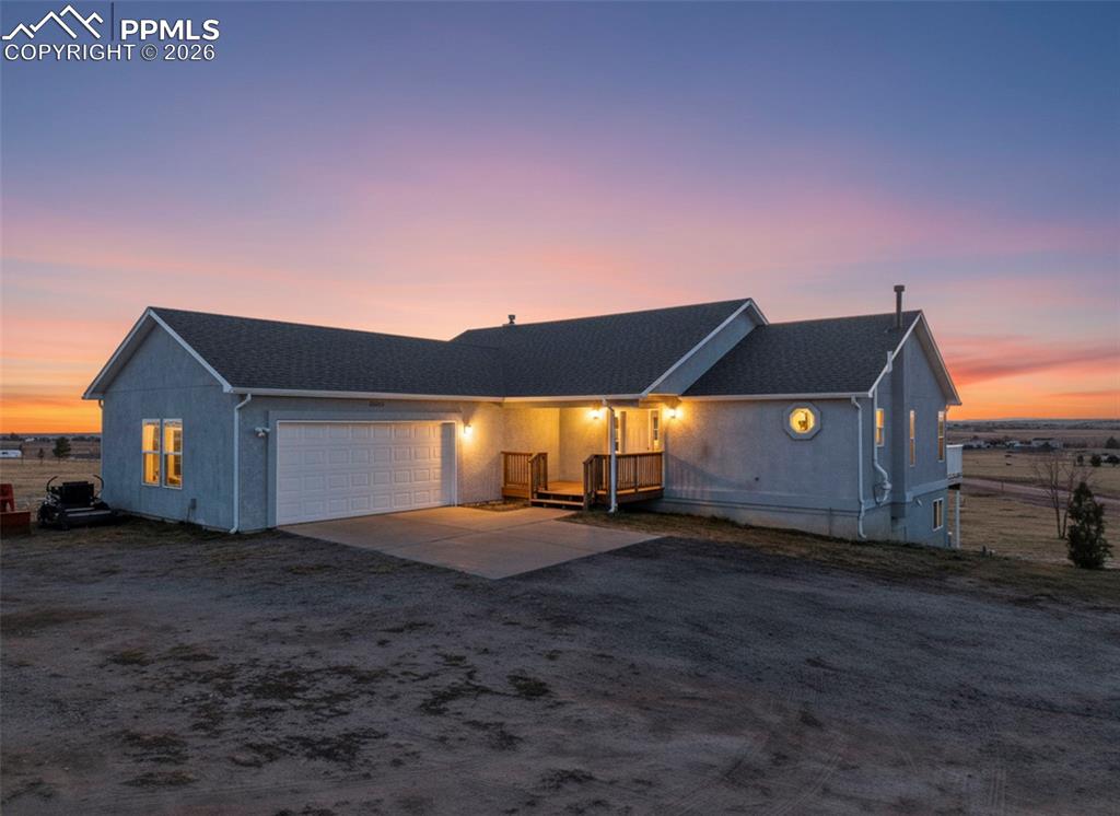 16575 Cathys Loop Peyton, CO 80831 - Photo 4 of 49 a view of a house with a yard