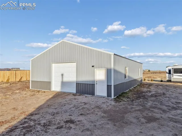 a view of parking garage with cars