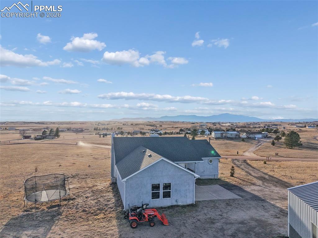 16575 Cathys Loop Peyton, CO 80831 - Photo 6 of 49 an aerial view of a house