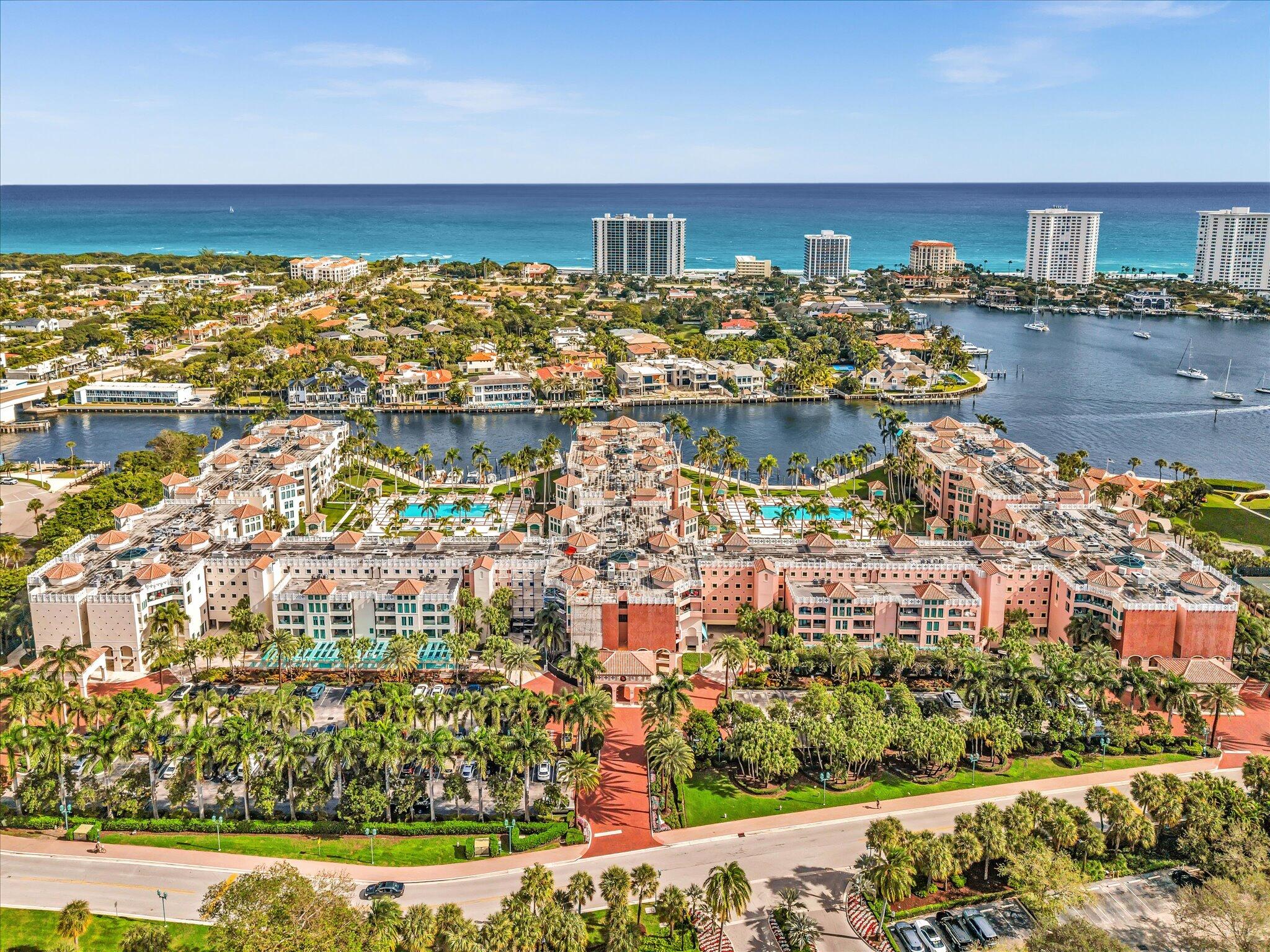 120 Southeast 5th Avenue, Unit 225 Boca Raton, FL 33432 - Photo 33 of 42 a view of a lake with a building in the background