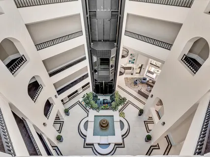 a view of living room with furniture and fireplace
