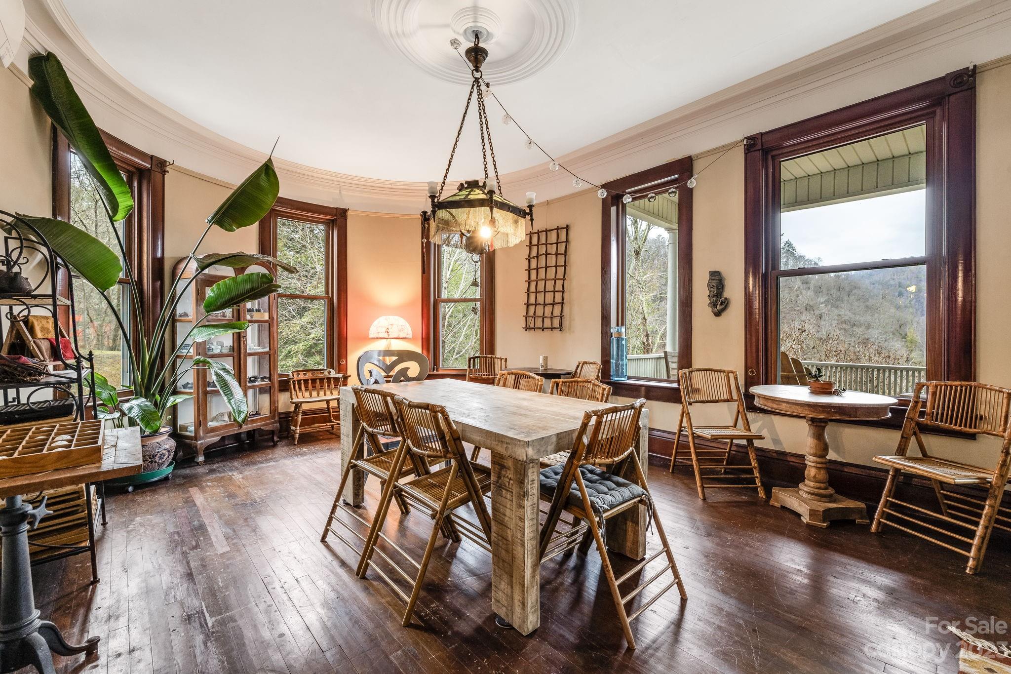 2412 Stackhouse Road Marshall, NC 28753 - Photo 11 of 48 a view of a livingroom with furniture window and wooden floor