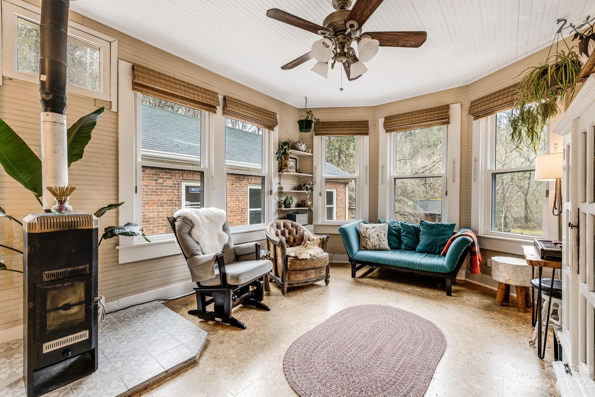 2412 Stackhouse Road Marshall, NC 28753 - Photo 23 of 48 a living room with furniture and a large window