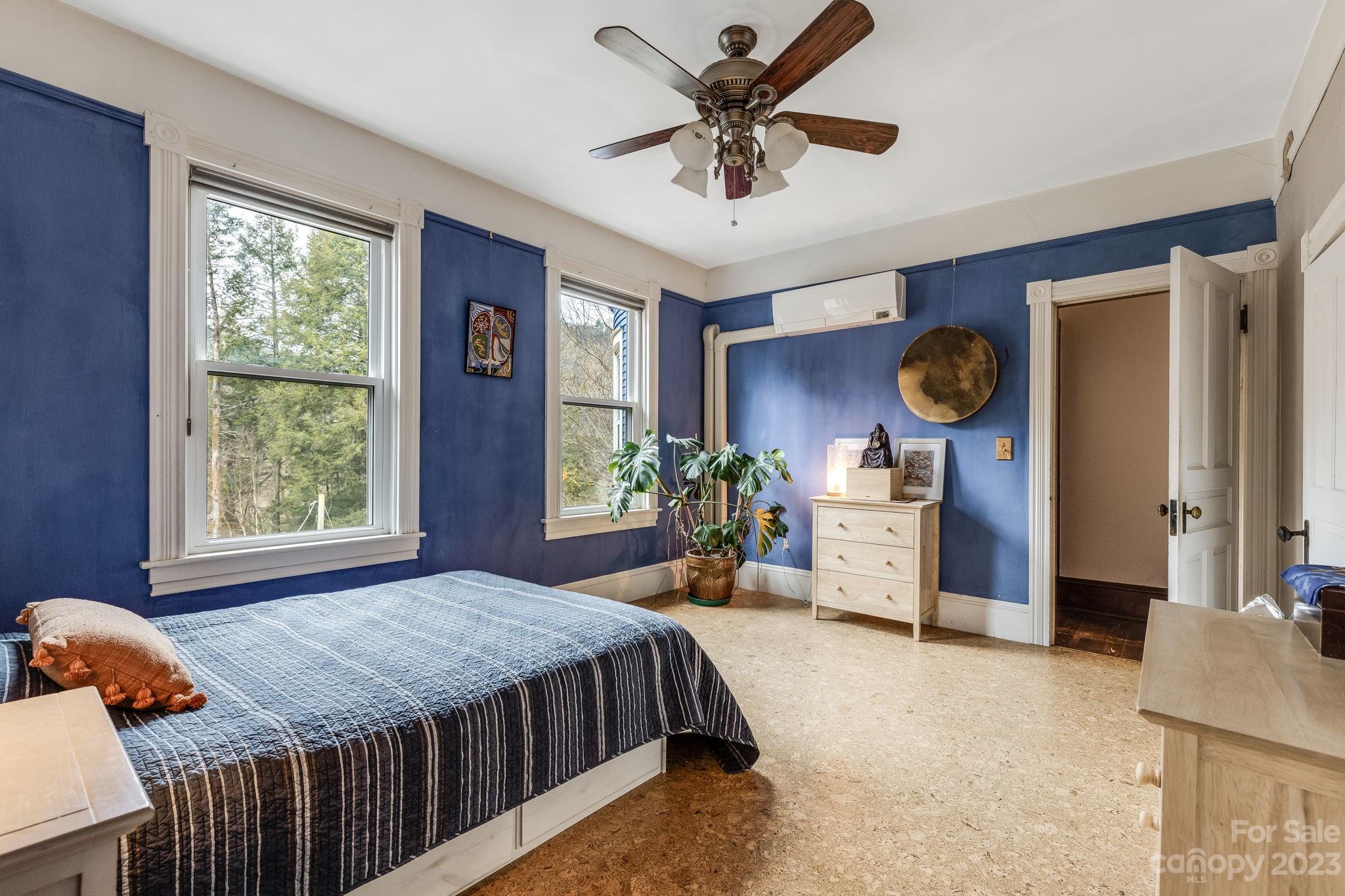 2412 Stackhouse Road Marshall, NC 28753 - Photo 29 of 48 a bed room with a bed and a window