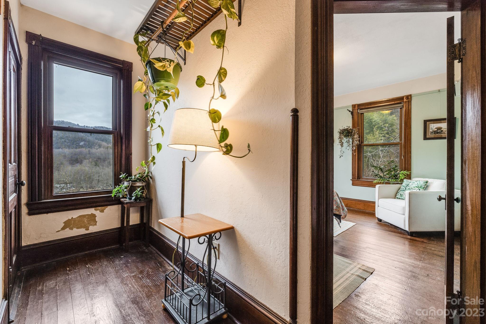 2412 Stackhouse Road Marshall, NC 28753 - Photo 37 of 48 a view of a living room and a balcony