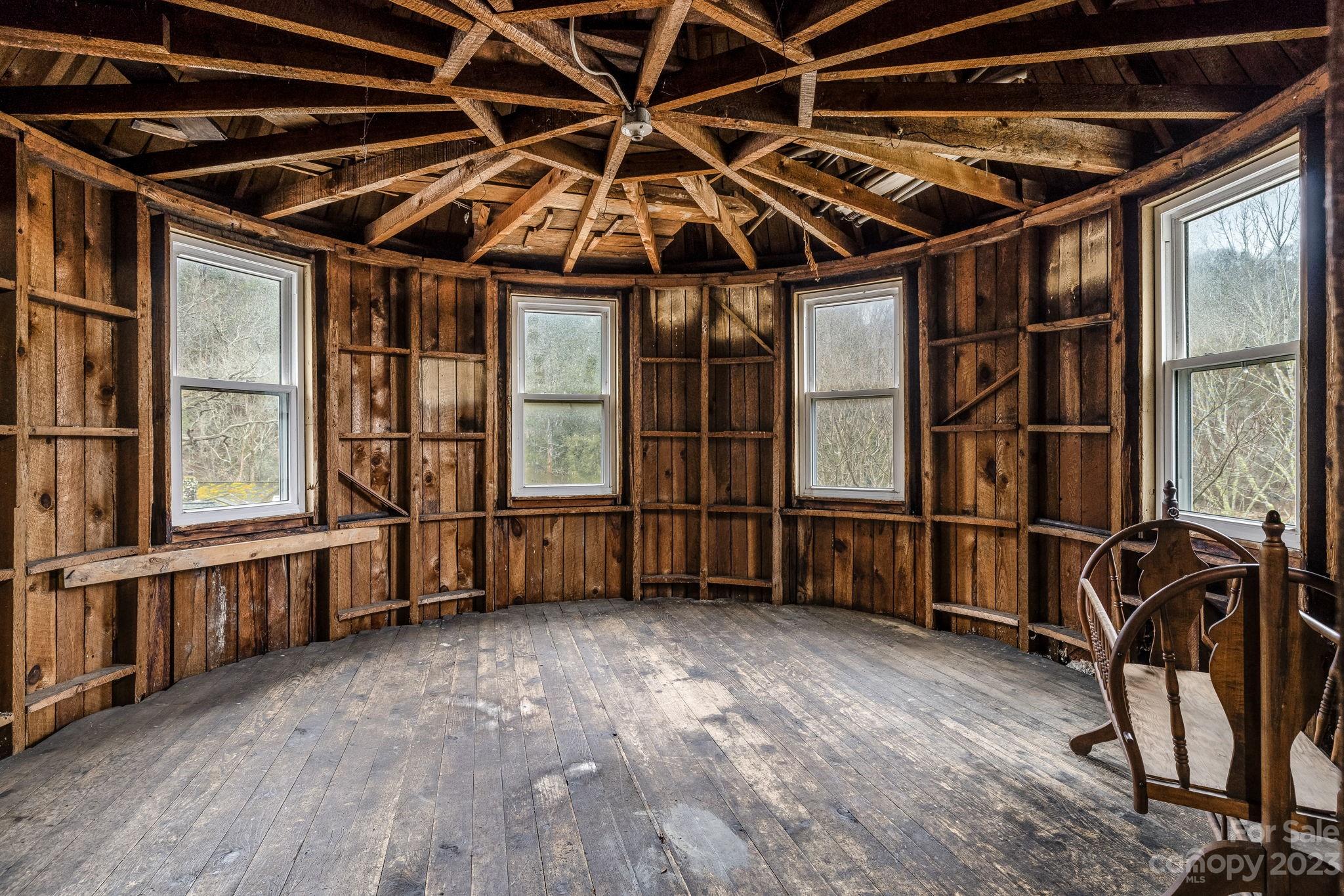 2412 Stackhouse Road Marshall, NC 28753 - Photo 39 of 48 a view of a room with wooden walls and roof