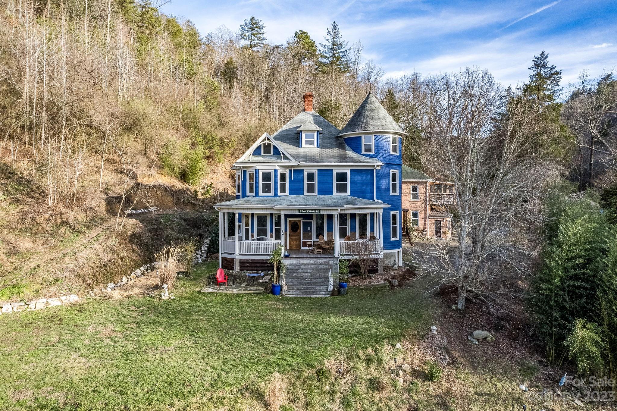 2412 Stackhouse Road Marshall, NC 28753 - Photo 4 of 48 front view of a house with a yard