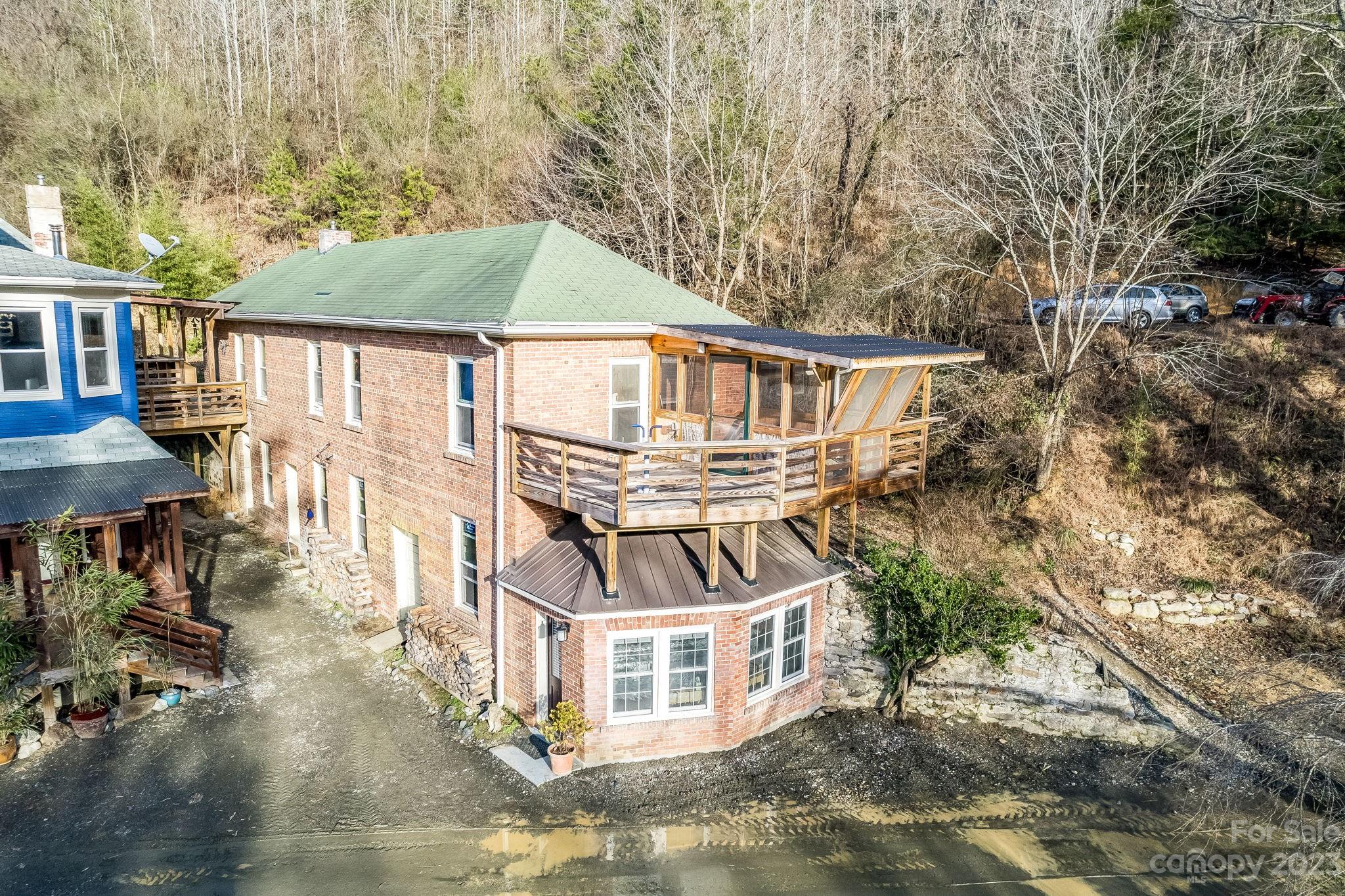 2412 Stackhouse Road Marshall, NC 28753 - Photo 41 of 48 front view of house with a yard