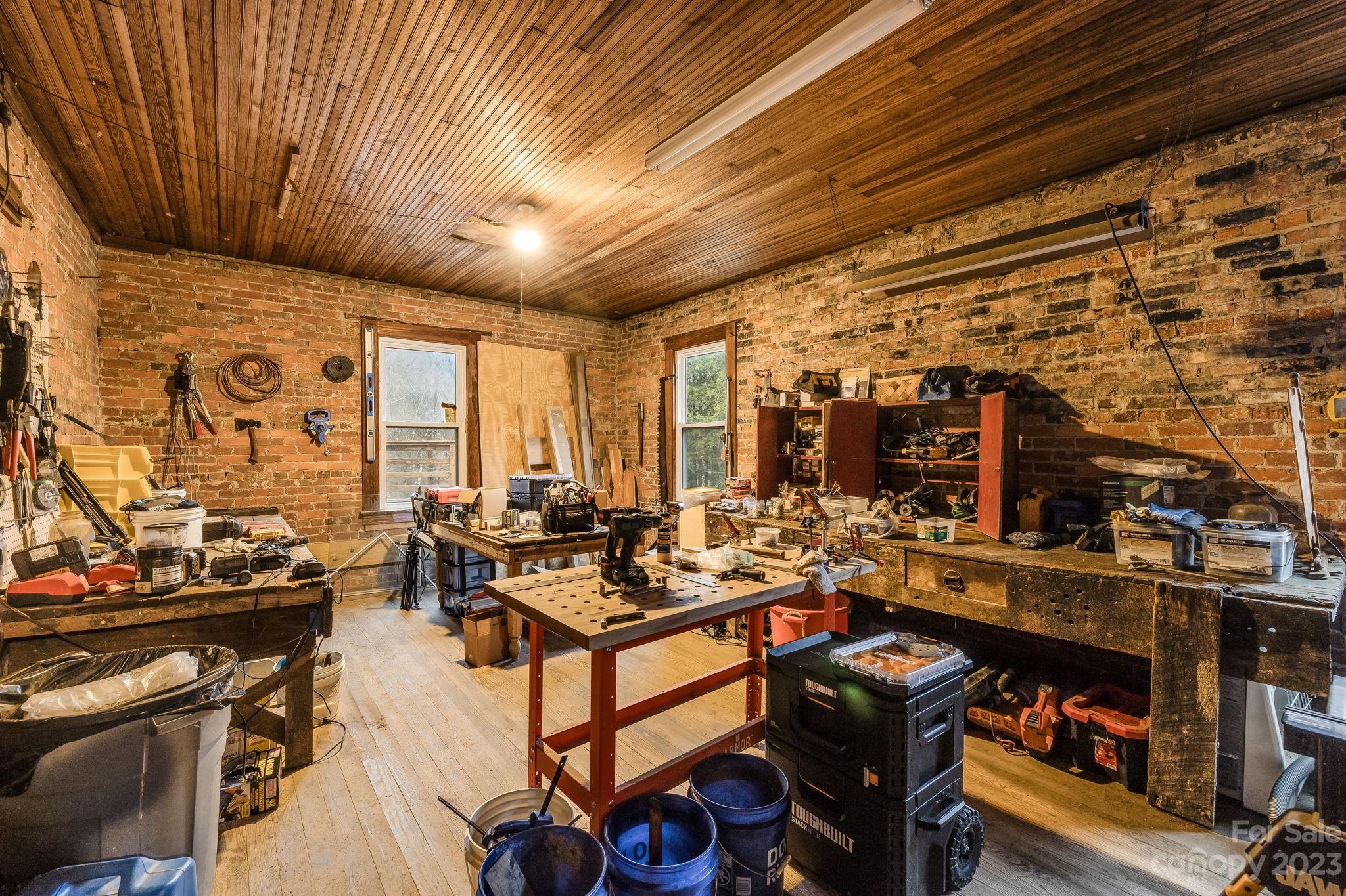2412 Stackhouse Road Marshall, NC 28753 - Photo 46 of 48 a very nice looking room with many windows