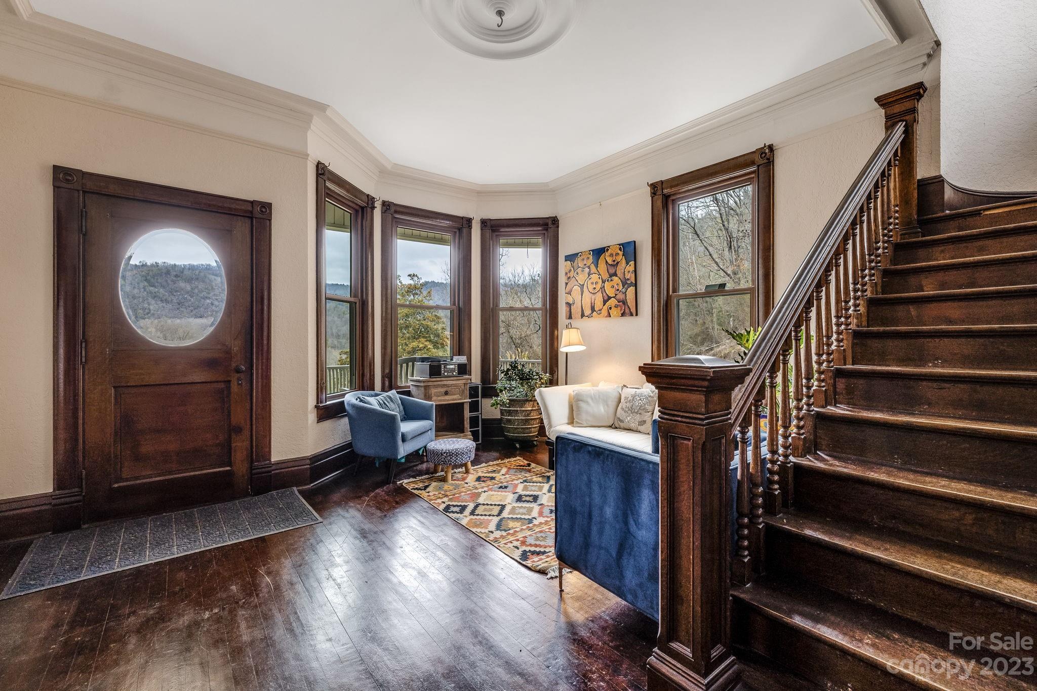 2412 Stackhouse Road Marshall, NC 28753 - Photo 9 of 48 a living room with furniture and a window
