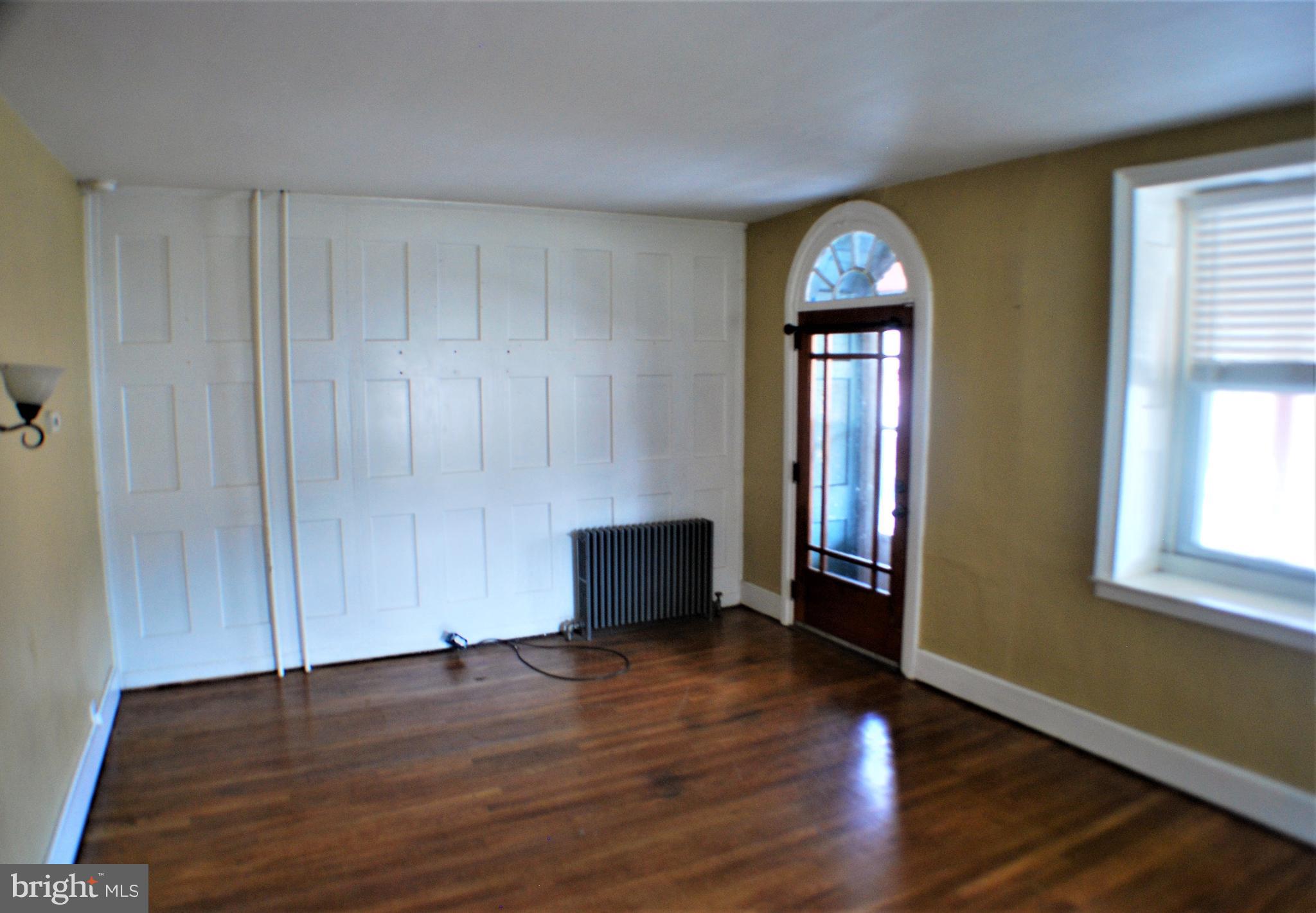 3199 Main Street Green Lane, PA 18054 - Photo 9 of 21 Living room with wainscoting