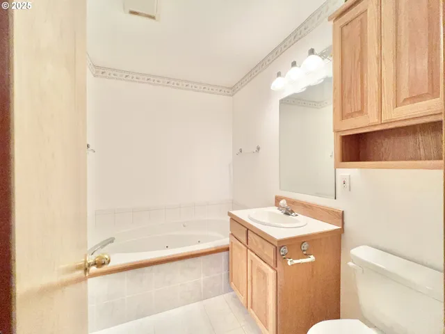 a bathroom with a sink a toilet and a bathtub