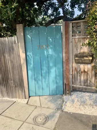 a view of a door in front of a house