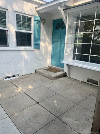 a view of a backyard of a house