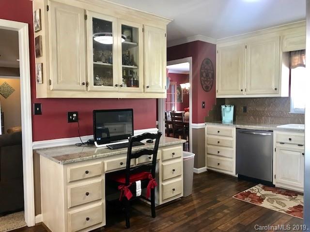 2802 Reece Drive Monroe, NC 28110 - Photo 11 of 37 a kitchen with cabinets appliances and a window