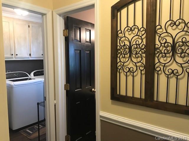 2802 Reece Drive Monroe, NC 28110 - Photo 14 of 37 a view of an entryway with wooden floor